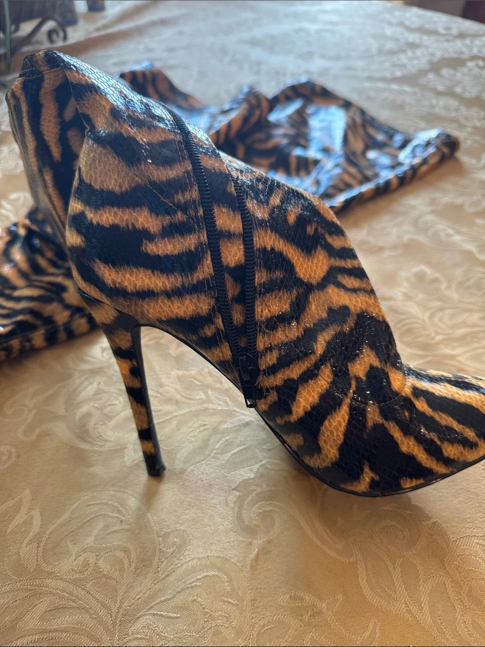 Fashion Nova tiger-print thigh-high boots size 9